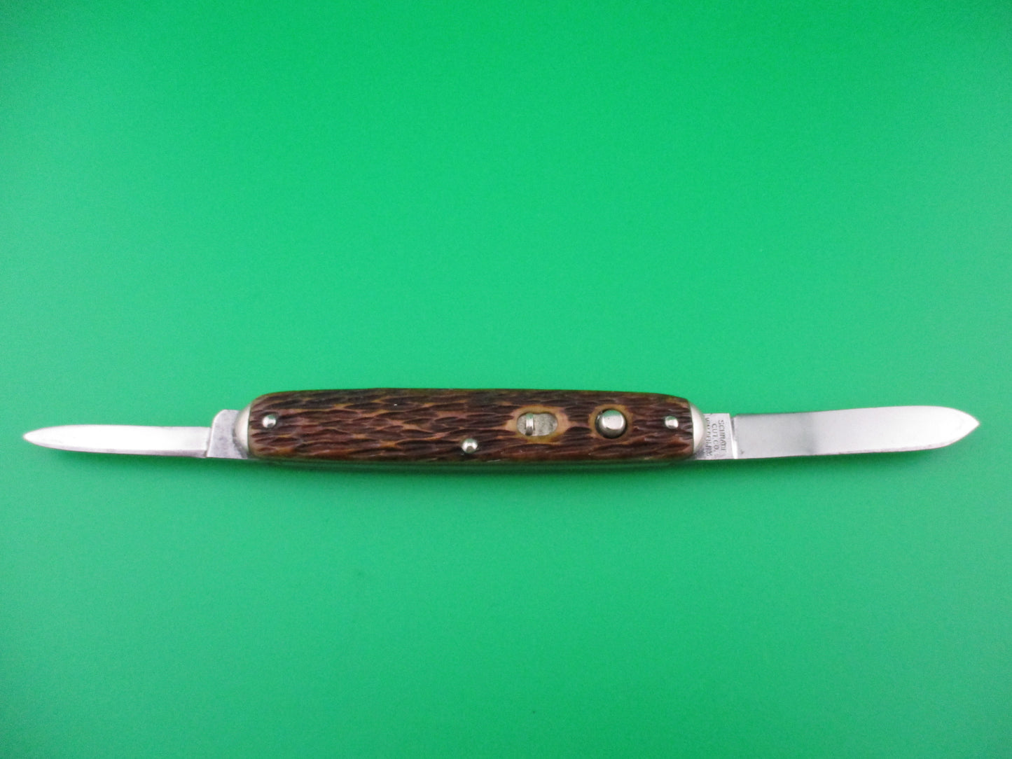 z Schrade Cut Co double Jigged bone tip bolsters automatic knife