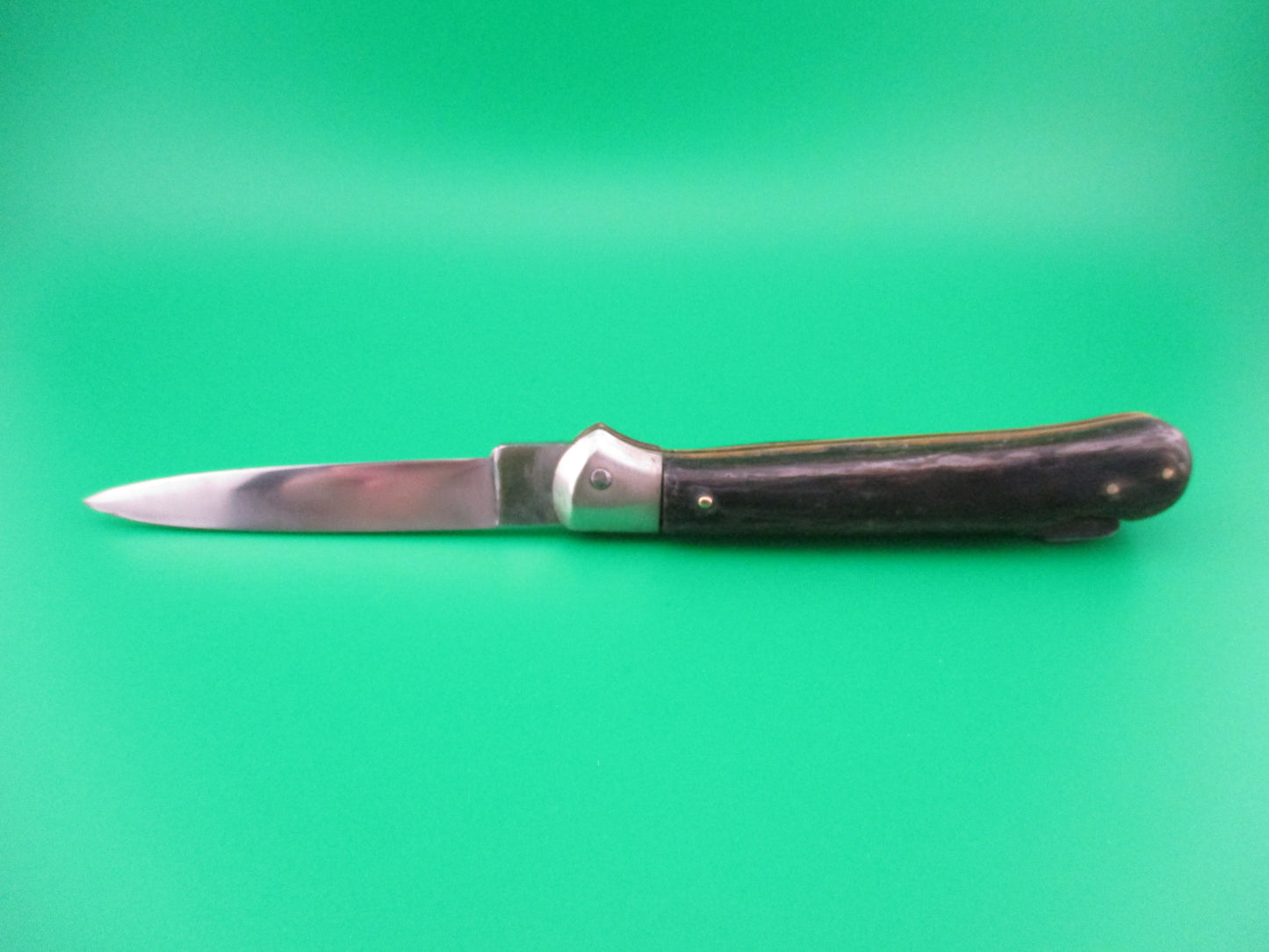 Rostfrei IMPORT 20cm Italian Birds head dark horn automatic knife