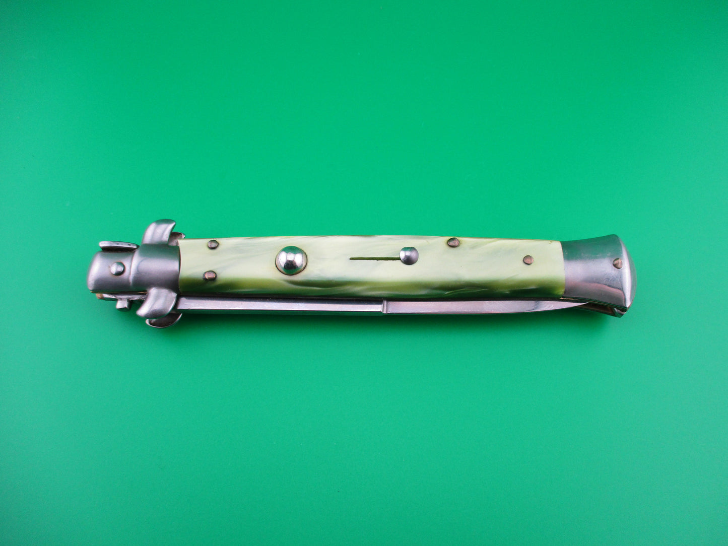 Italian 28cm Stiletto Swivel bolster Green pearlex automatic knife sterile