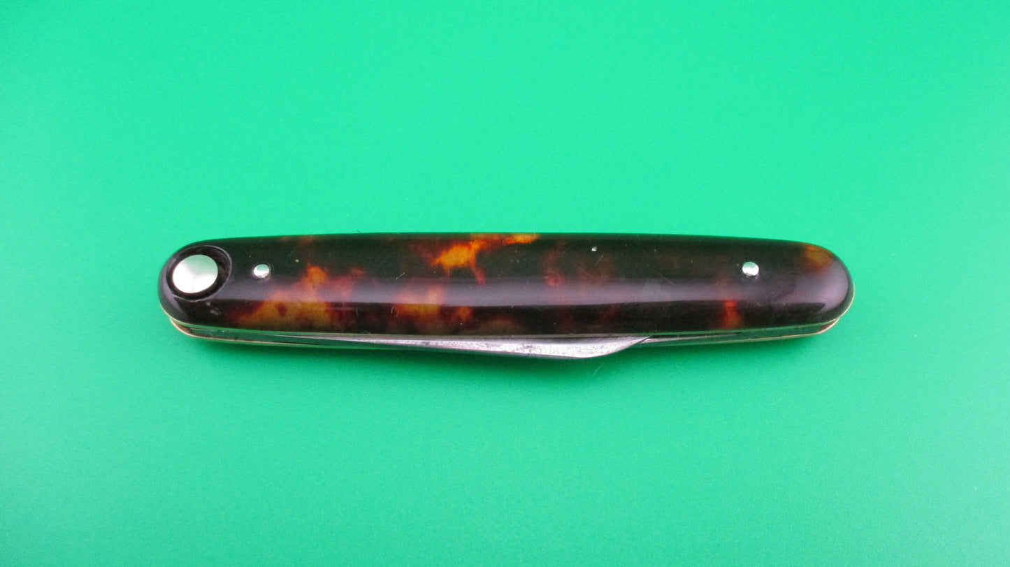 z Press Button Knife Co medium double Tortoise Cell etched STILETTO w/ sword