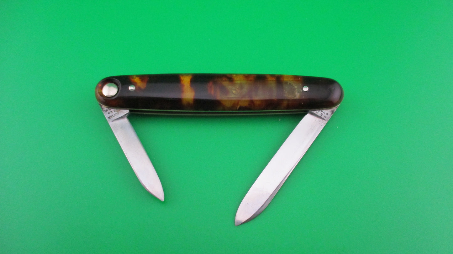 z Press Button Knife Co medium double Tortoise Cell etched STILETTO w/ sword