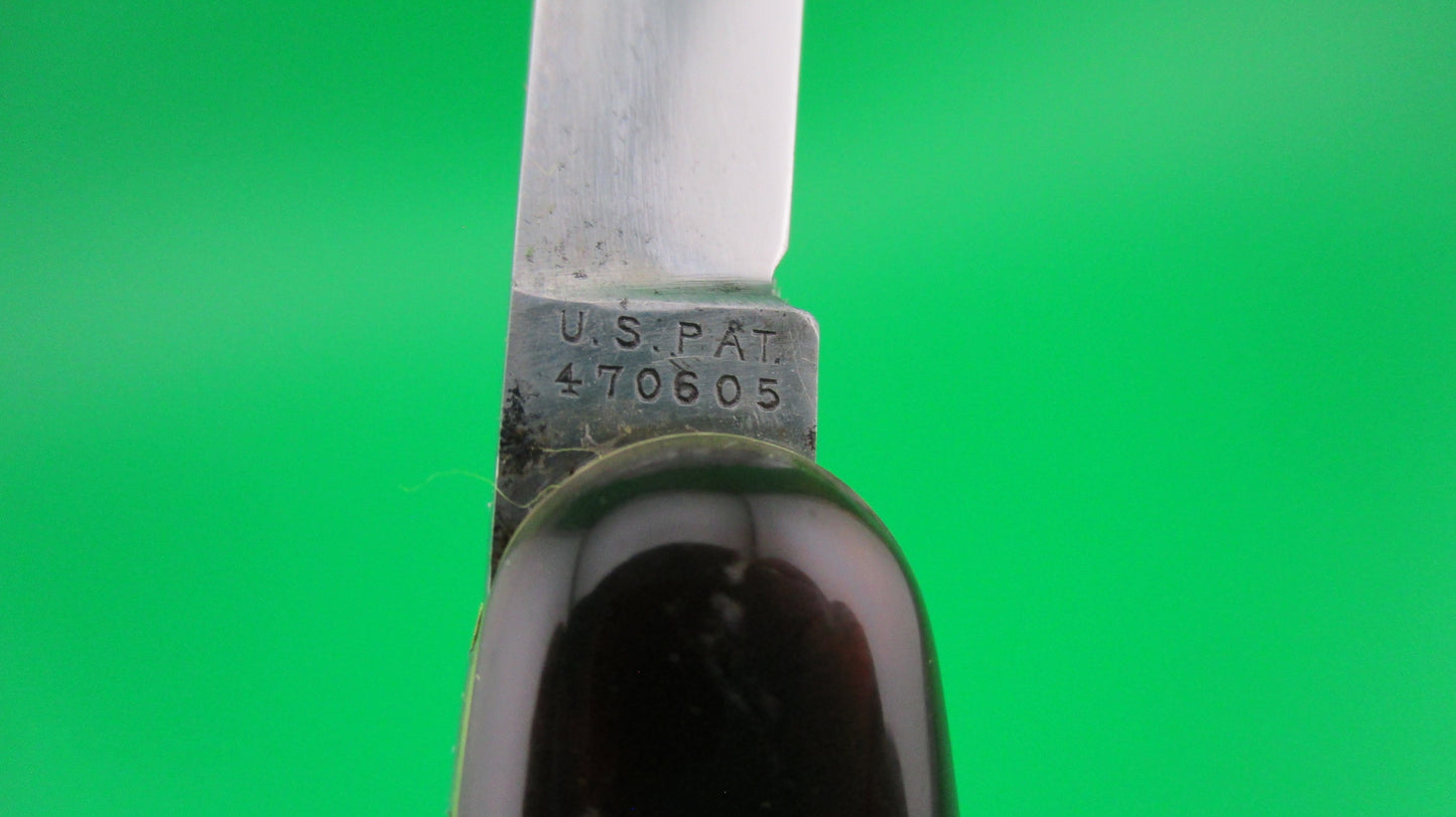 z Press Button Knife Co medium double Tortoise Cell etched STILETTO w/ sword