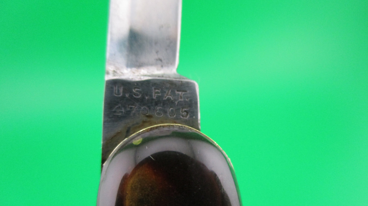 z Press Button Knife Co medium double Tortoise Cell etched STILETTO w/ sword