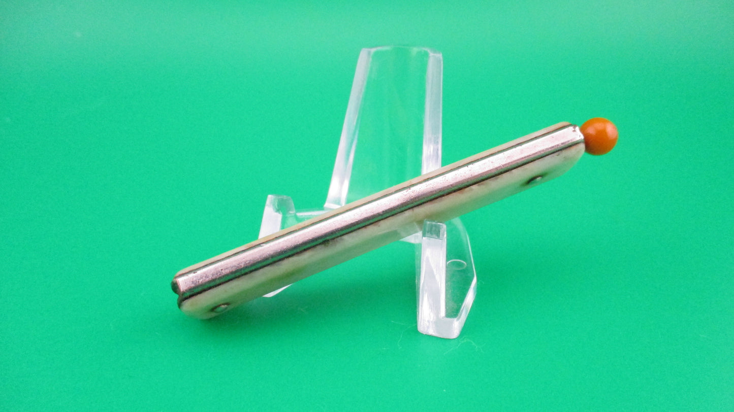 Remington R17 Pullball Onyx scales Orange pull automatic knife