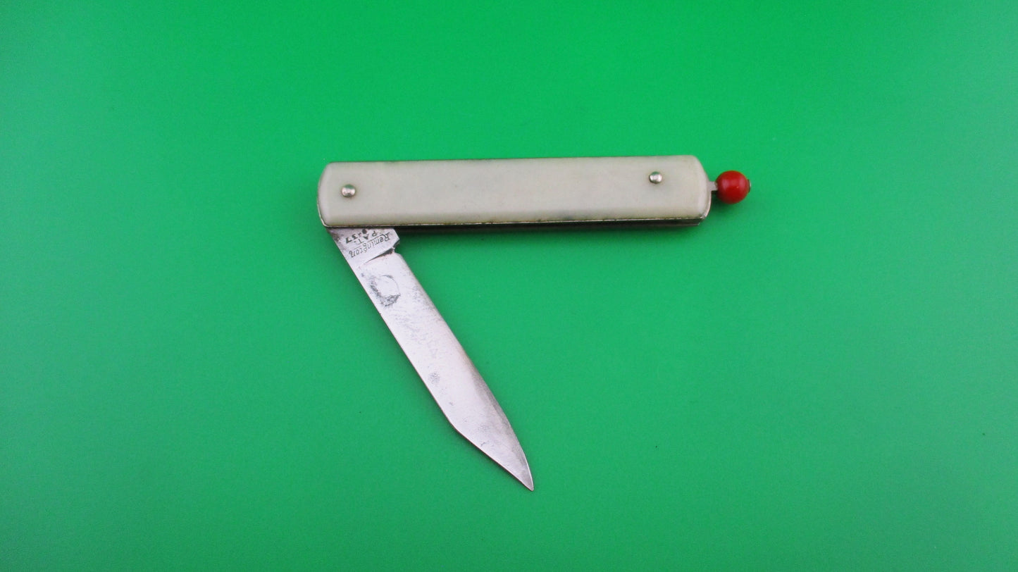 Remington R17 Pullball Onyx scales Red pull automatic knife