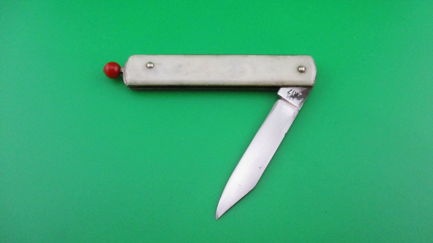 Remington R17 Pullball Onyx scales Red pull automatic knife