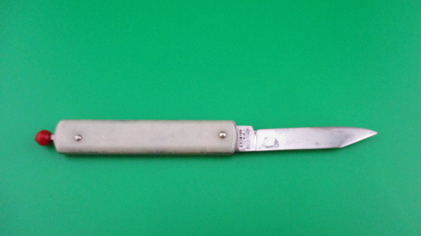 Remington R17 Pullball Onyx scales Red pull automatic knife