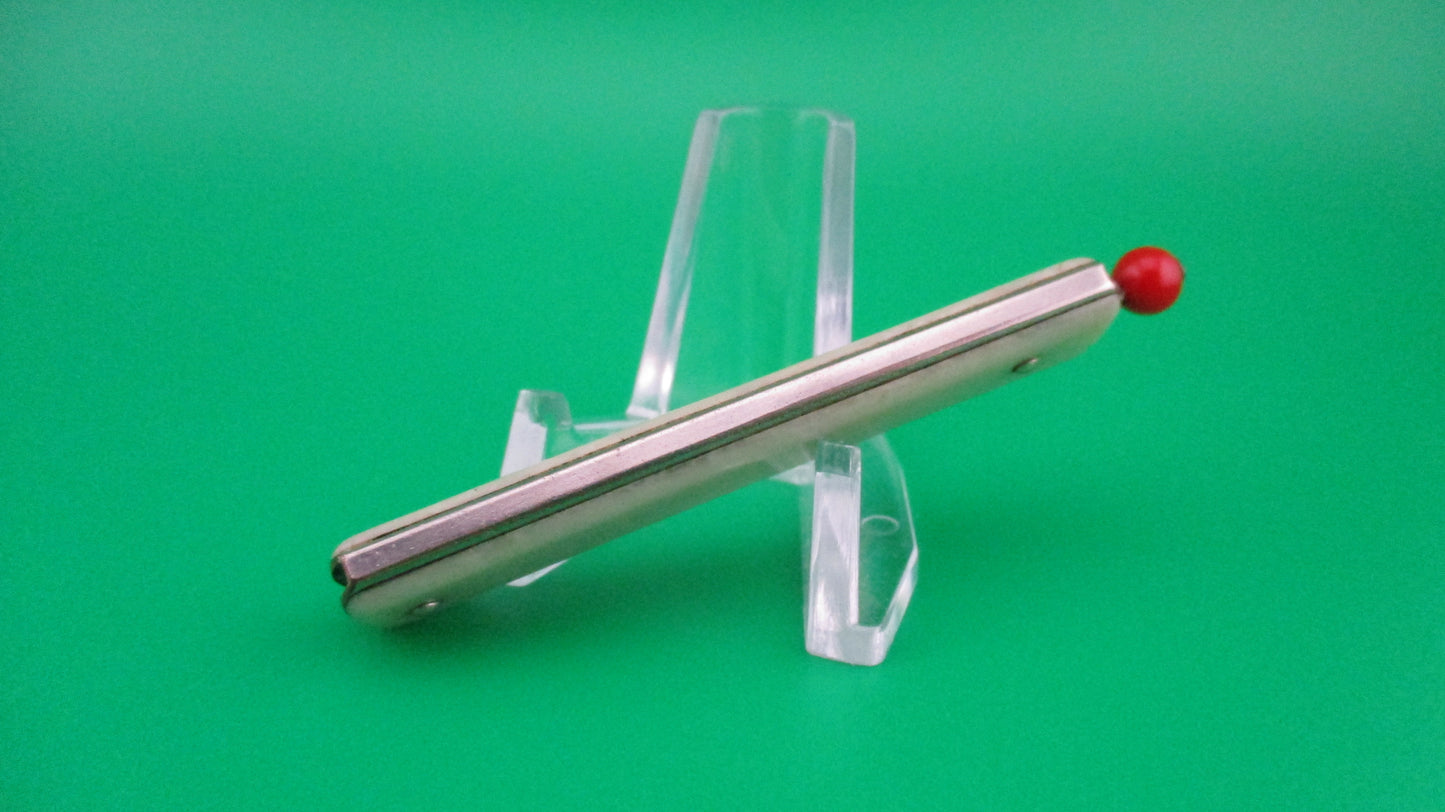 Remington R17 Pullball Onyx scales Red pull automatic knife