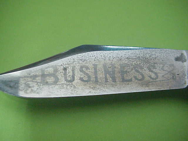 Press Button Knife Co Business model antique automatic knife w Nice ETCH
