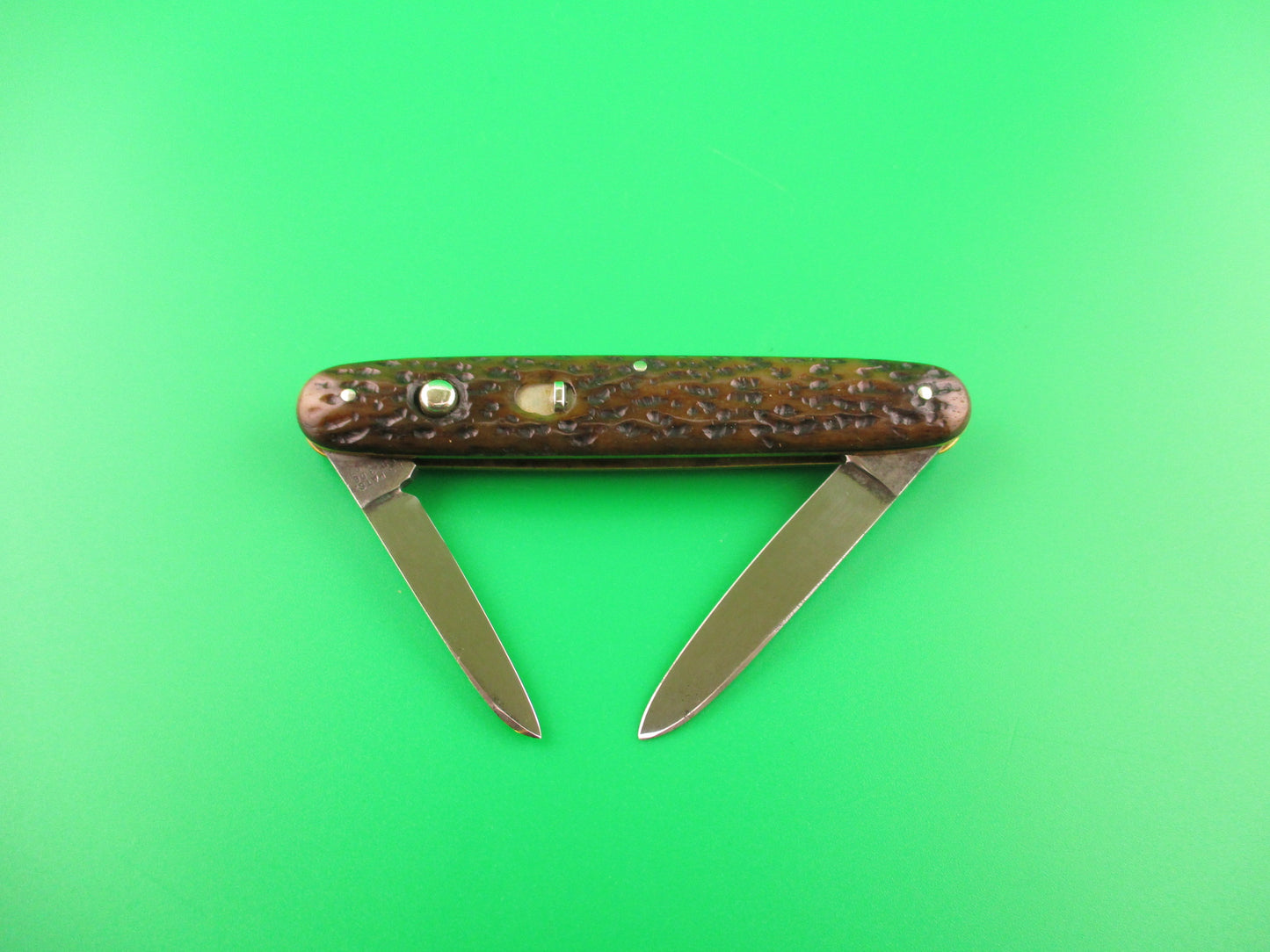 SHAPLEIGH D.E. HDW CO S1ST Medium 3 3/8" double Picked bone automatic knife