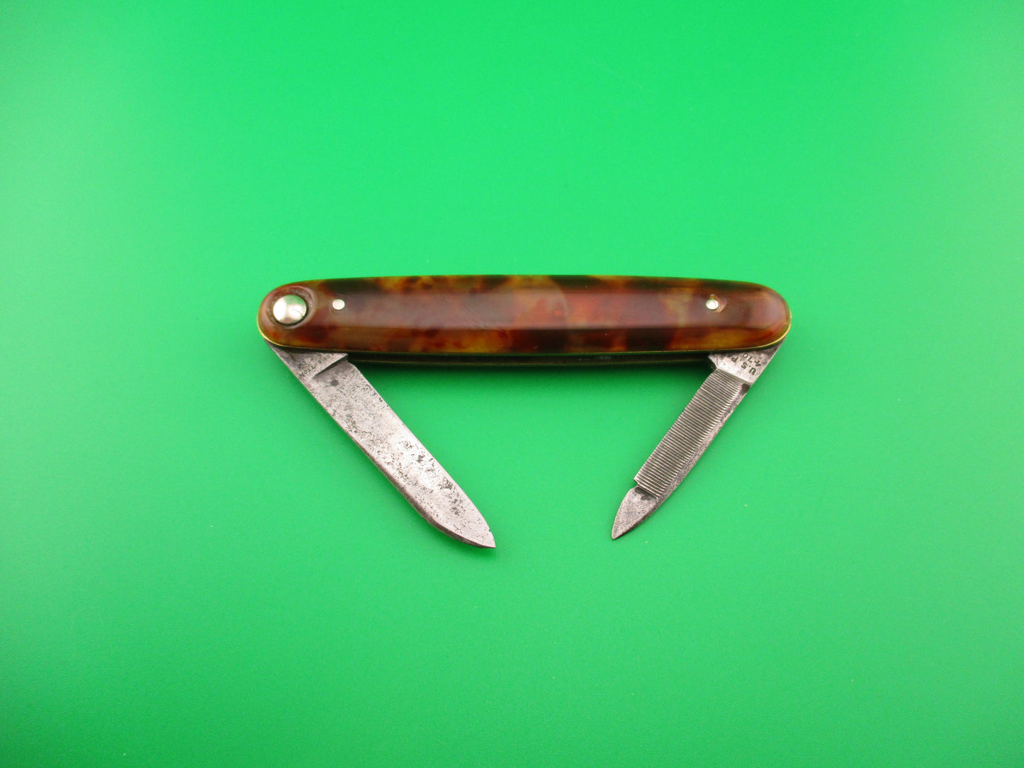 Press Button Knife Co #202 medium double Tortoise celluloid automatic knife