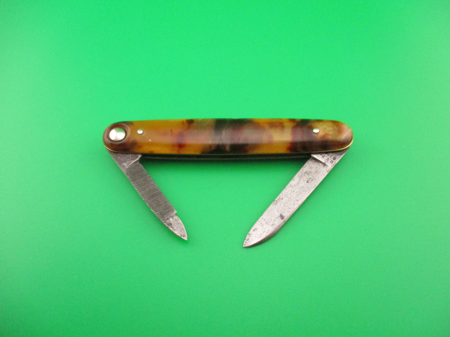 Press Button Knife Co #202 medium double Tortoise celluloid automatic knife