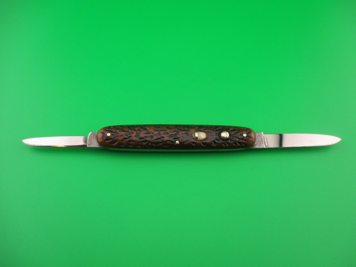 SHAPLEIGH D.E. HDW CO S1ST Medium 3 3/8" double Picked bone automatic knife