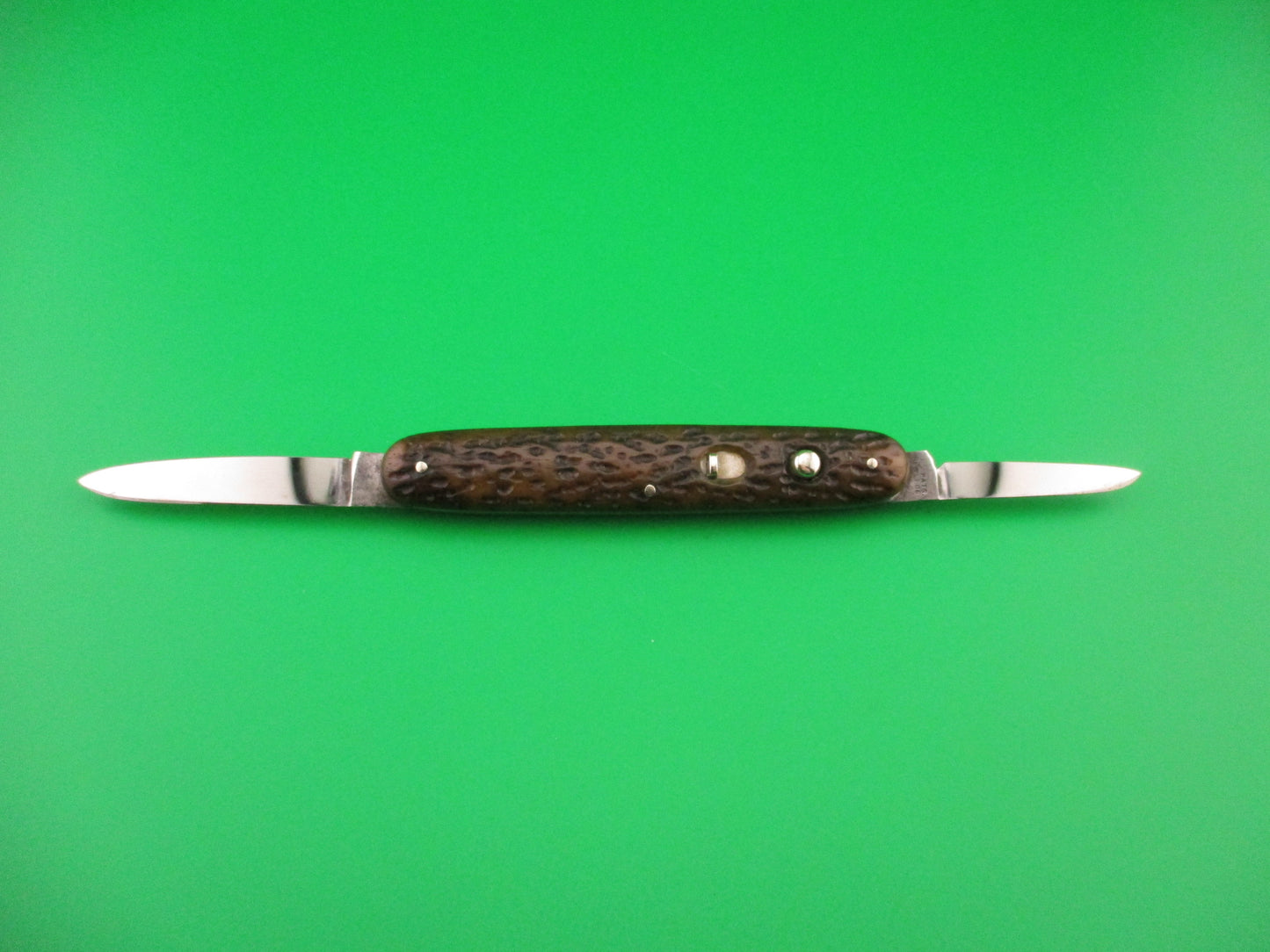 SHAPLEIGH D.E. HDW CO S1ST Medium 3 3/8" double Picked bone automatic knife
