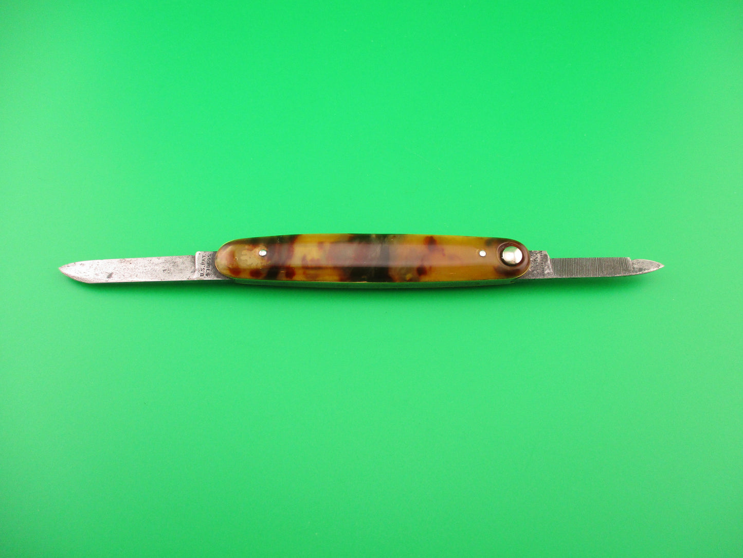 Press Button Knife Co #202 medium double Tortoise celluloid automatic knife