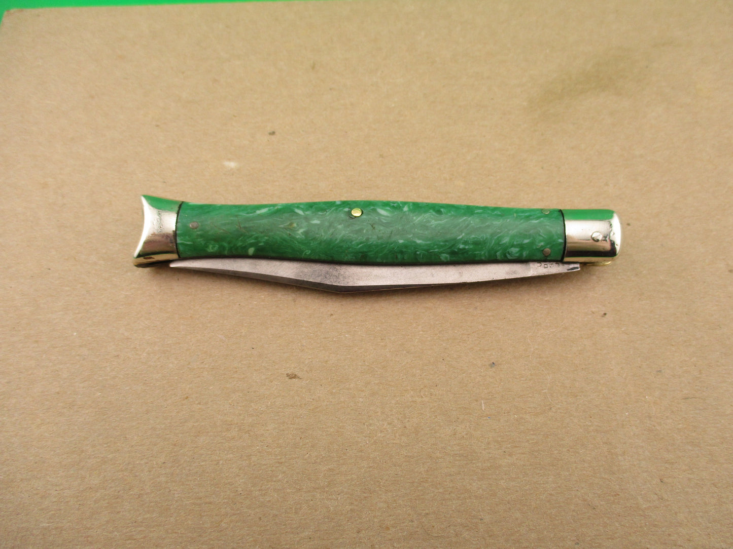 Schrade Cut Co Fishtail Green swirl vintage automatic knife with bolsters