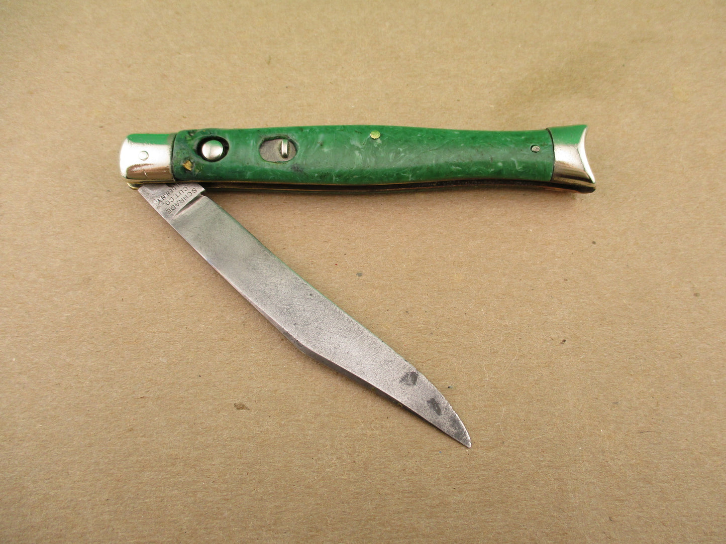 Schrade Cut Co Fishtail Green swirl vintage automatic knife with bolsters