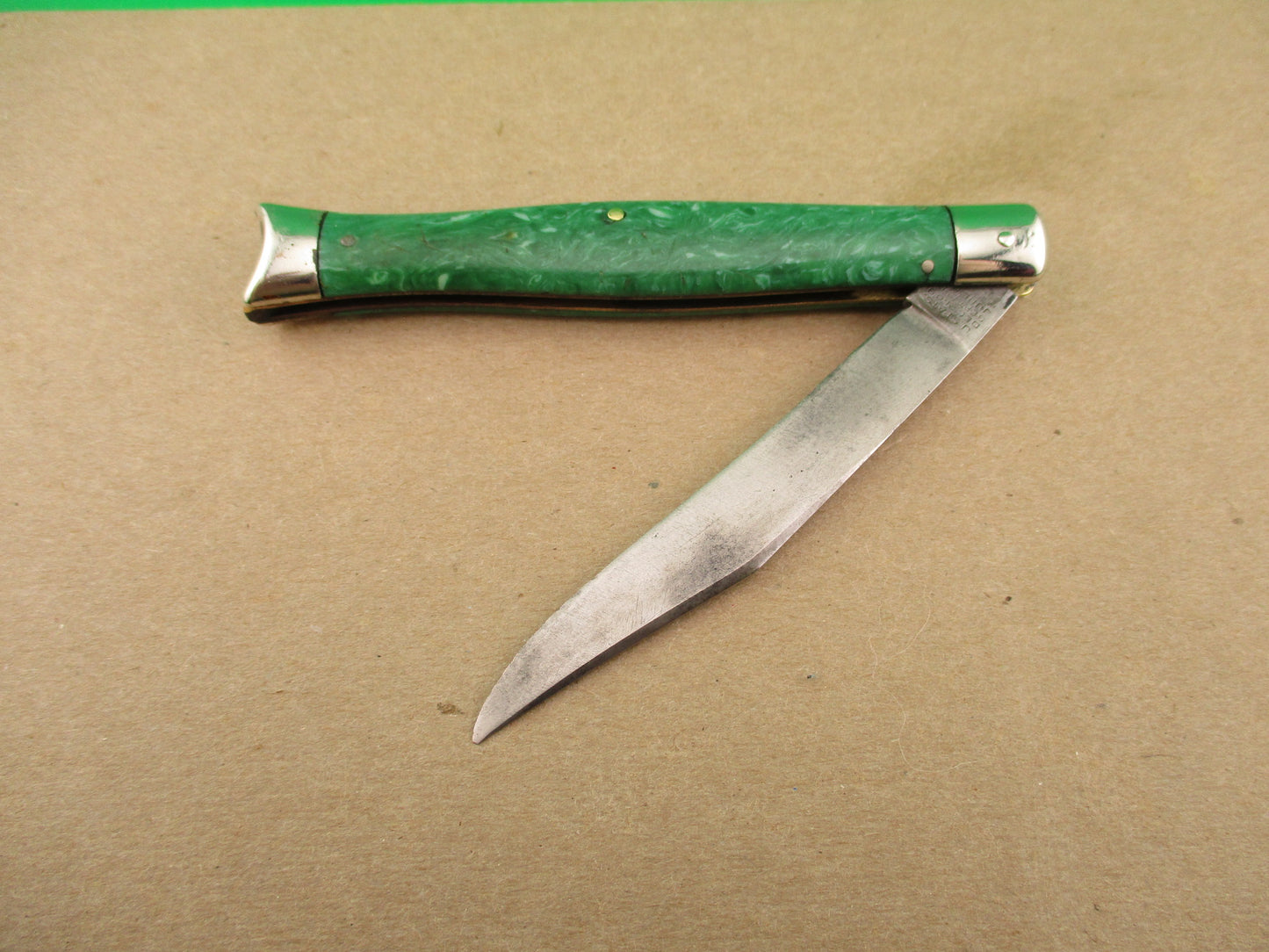 Schrade Cut Co Fishtail Green swirl vintage automatic knife with bolsters