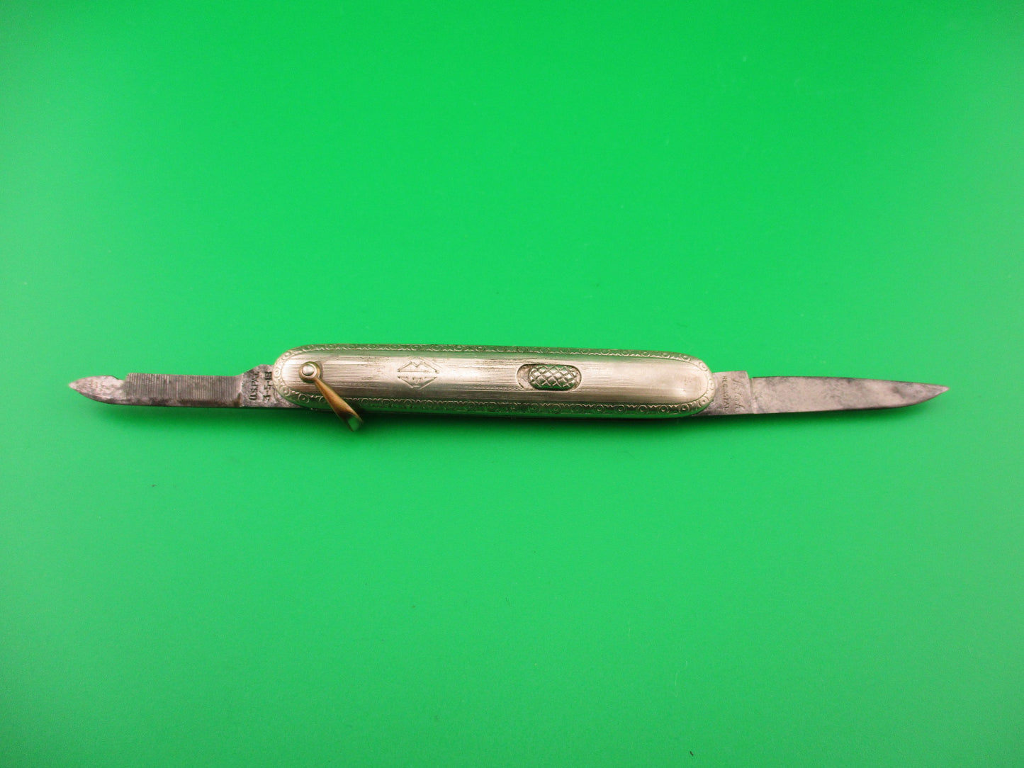 Flylock Small Silver double switchblade vintage knife w/shackle & file blade