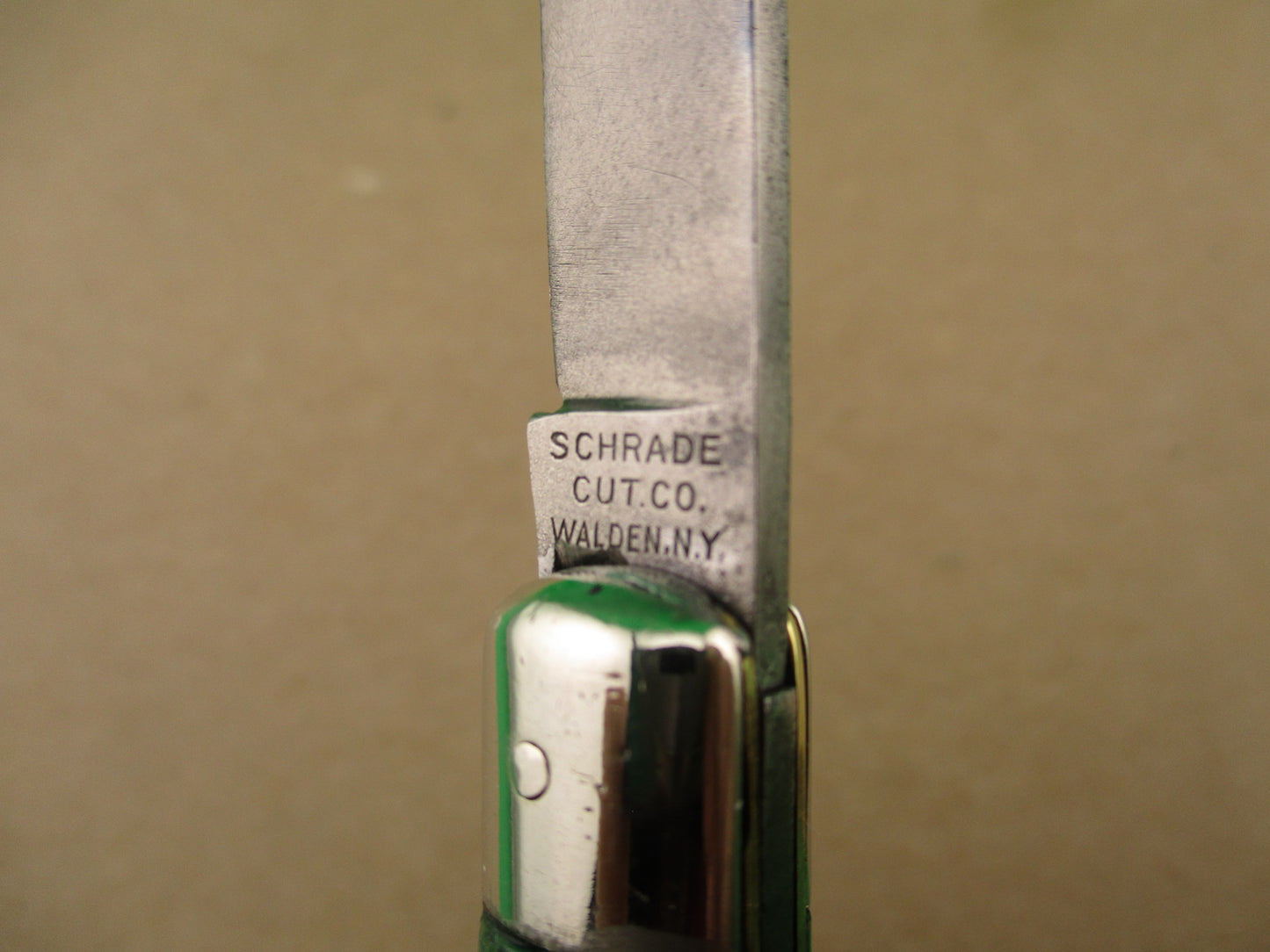 Schrade Cut Co Fishtail Green swirl vintage automatic knife with bolsters