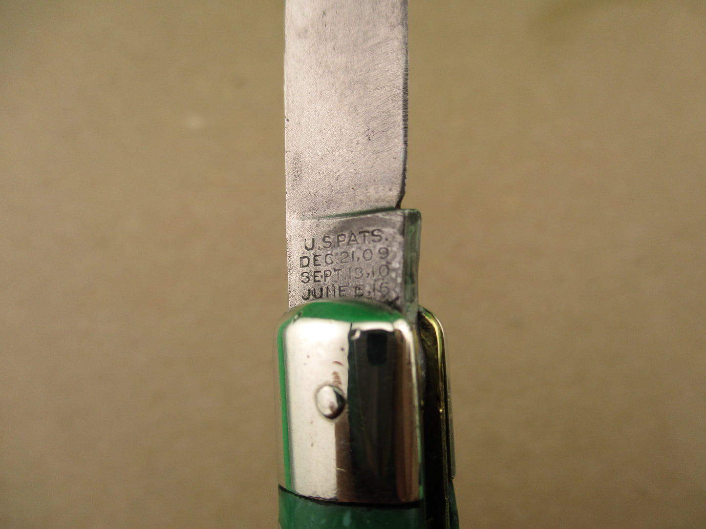 Schrade Cut Co Fishtail Green swirl vintage automatic knife with bolsters