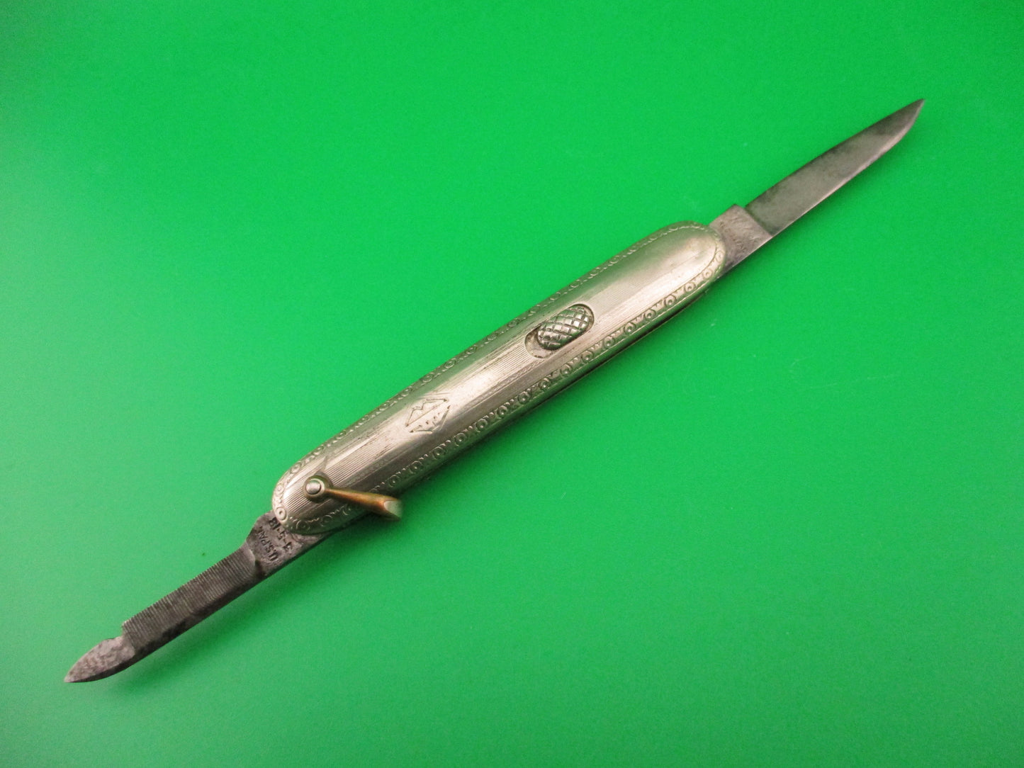 Flylock Small Silver double switchblade vintage knife w/shackle & file blade