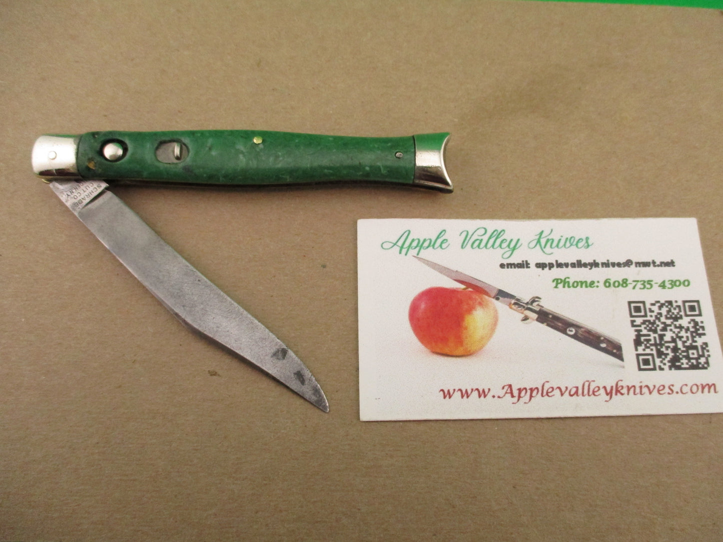 Schrade Cut Co Fishtail Green swirl vintage automatic knife with bolsters