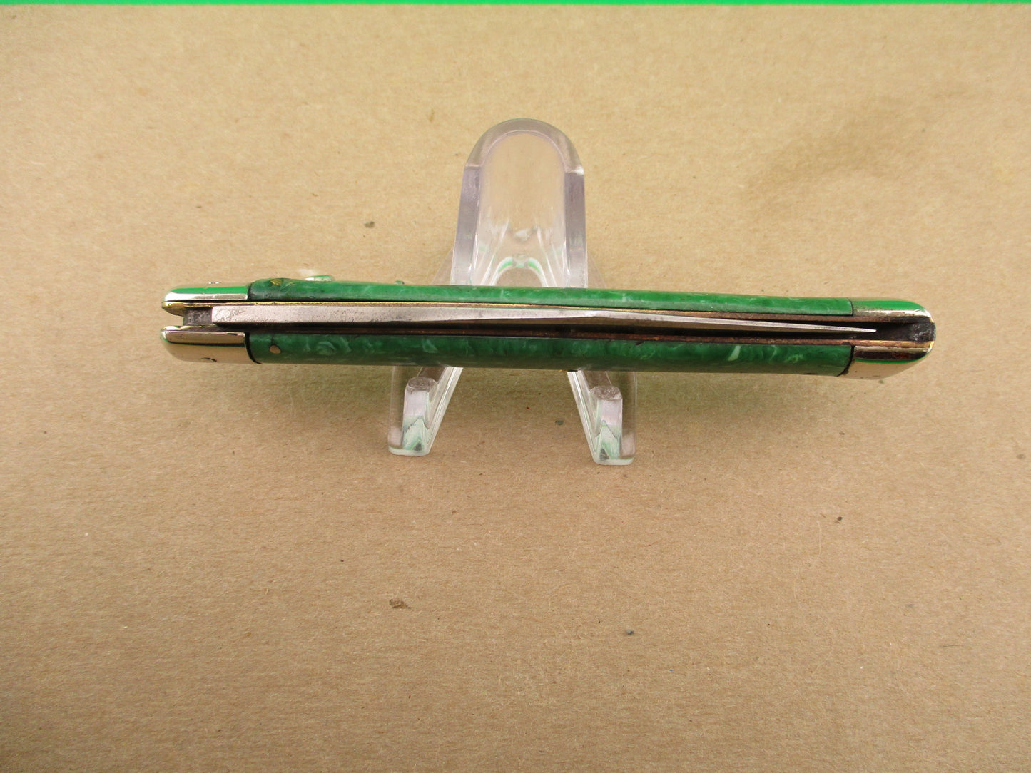 Schrade Cut Co Fishtail Green swirl vintage automatic knife with bolsters