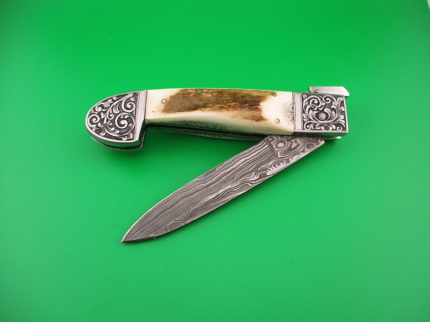 Custom 27cm Damascus & Stag Engraved bolsters Fulcrum release hand made automatic knife