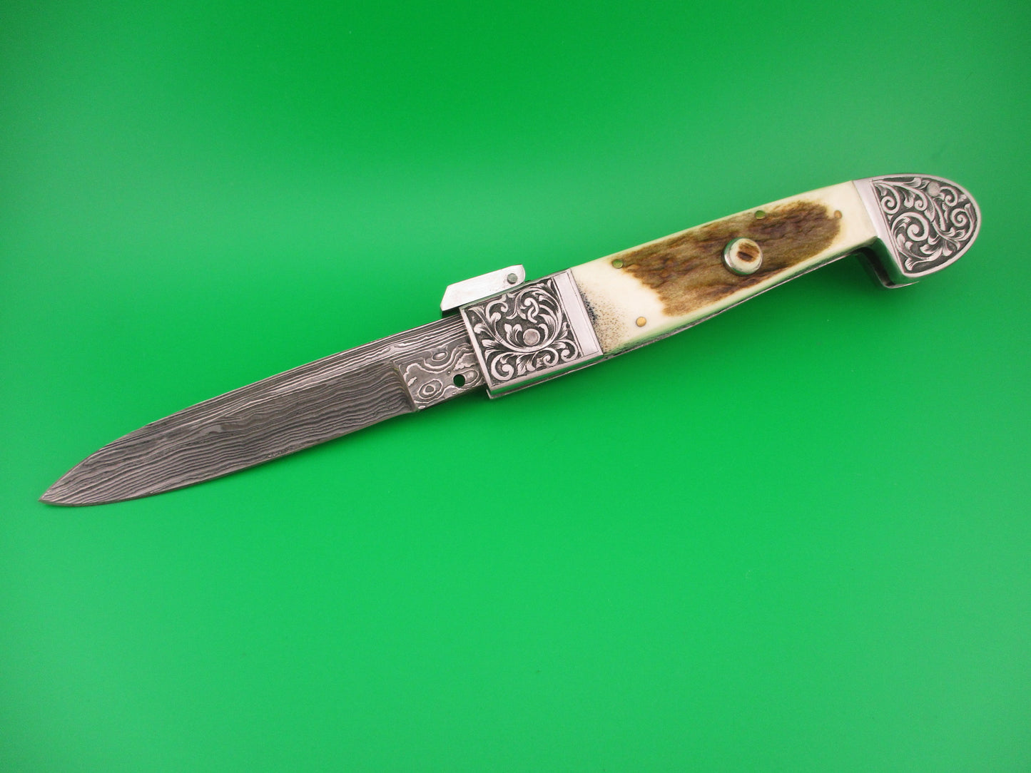 Custom 27cm Damascus & Stag Engraved bolsters Fulcrum release hand made automatic knife