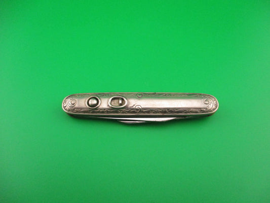 SCHRADE CUT CO Medium double German Silver Deluxe Scroll switchblade knife