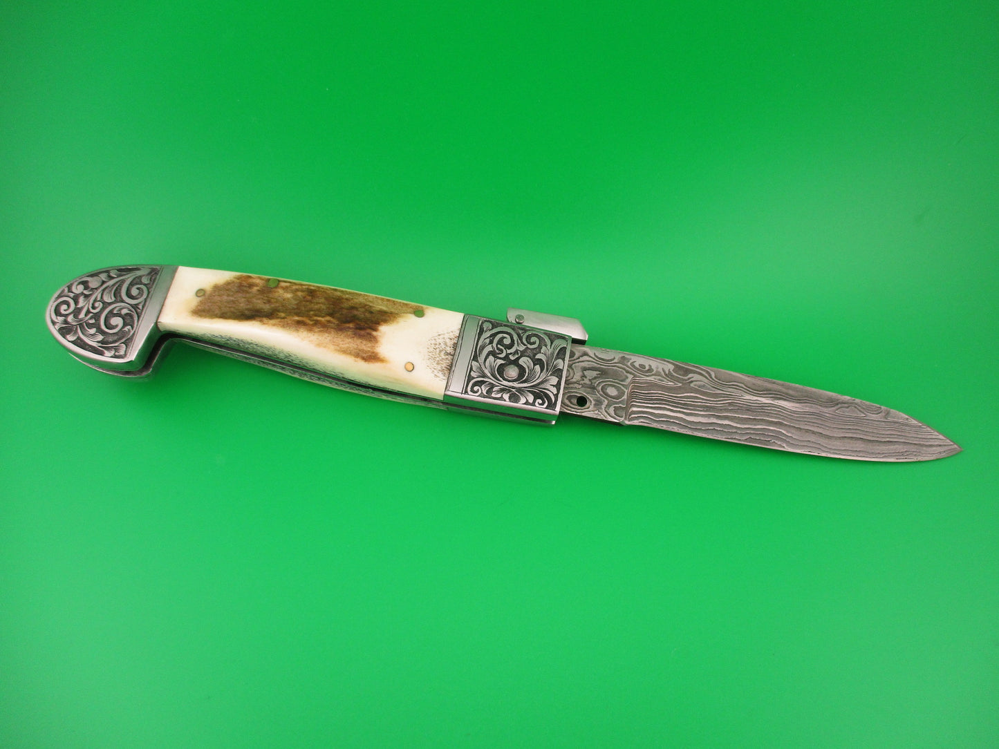 Custom 27cm Damascus & Stag Engraved bolsters Fulcrum release hand made automatic knife