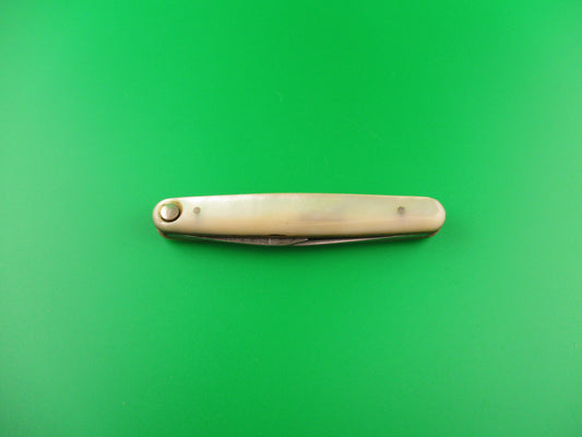 Knife on a green background