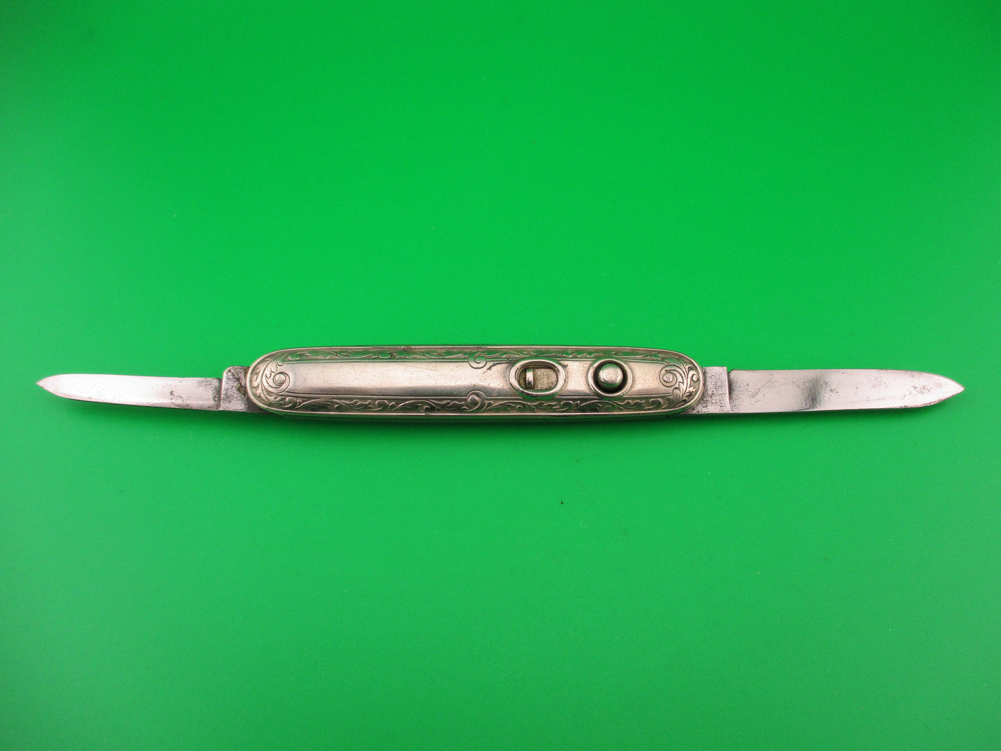 SCHRADE CUT CO Medium double German Silver Deluxe Scroll switchblade knife