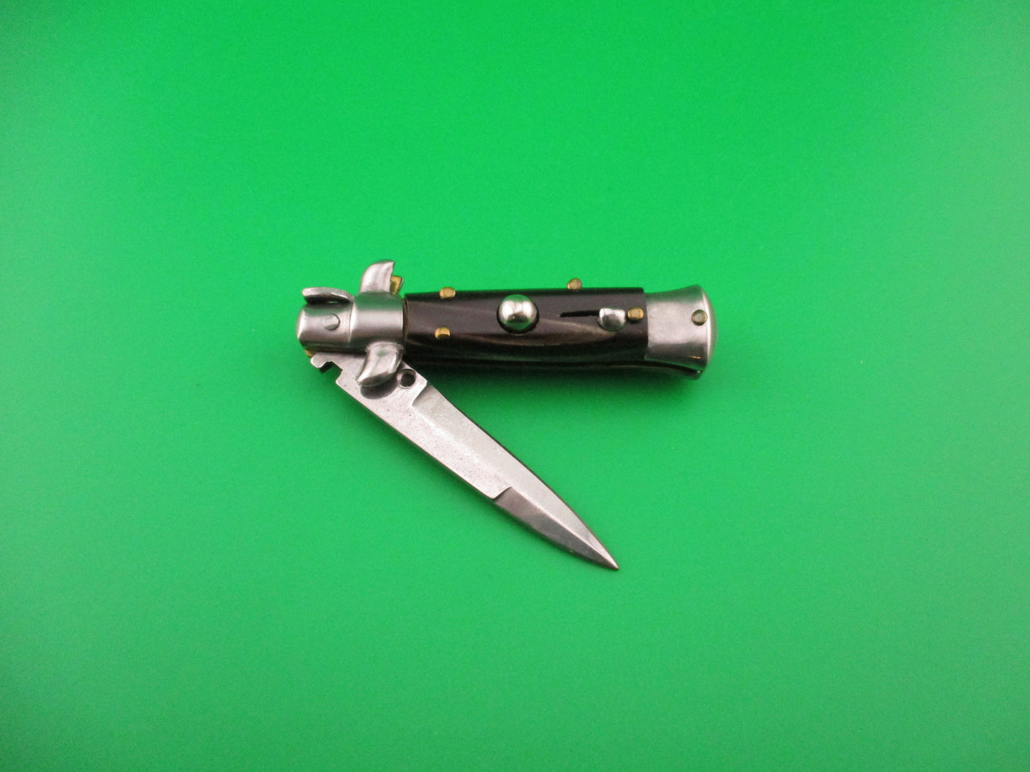 MANIAGO ITALY 12cm Italian Swivel bolster Bayonet streaked horn automatic knife