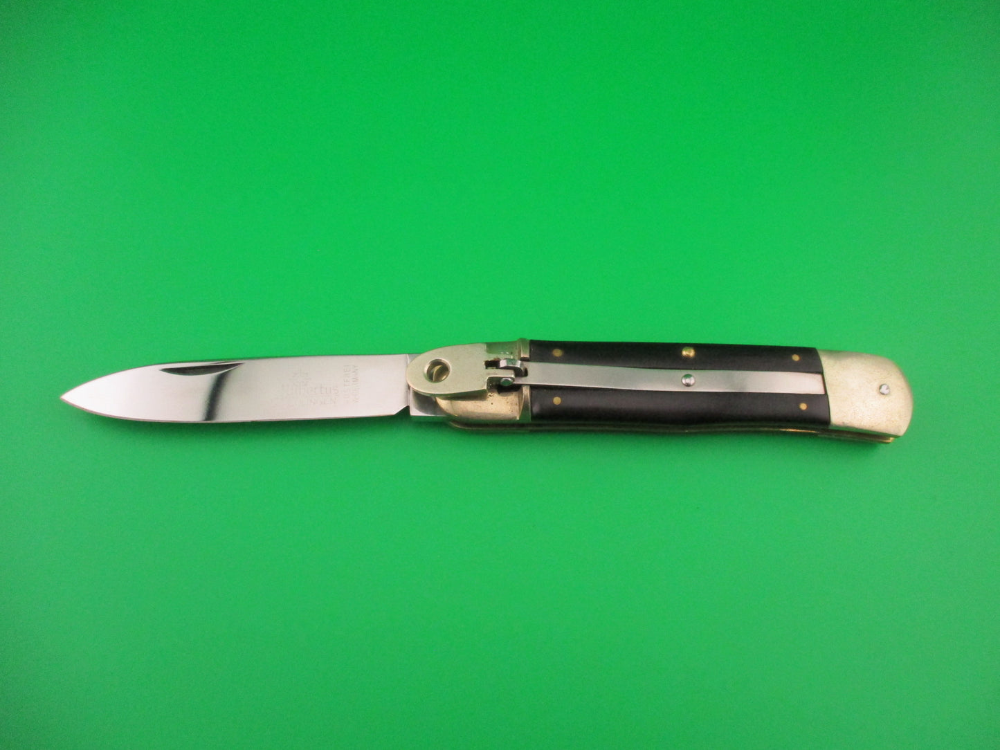 Hubertus Solingen 11cm West Germany Lever Black Micarta automatic knife