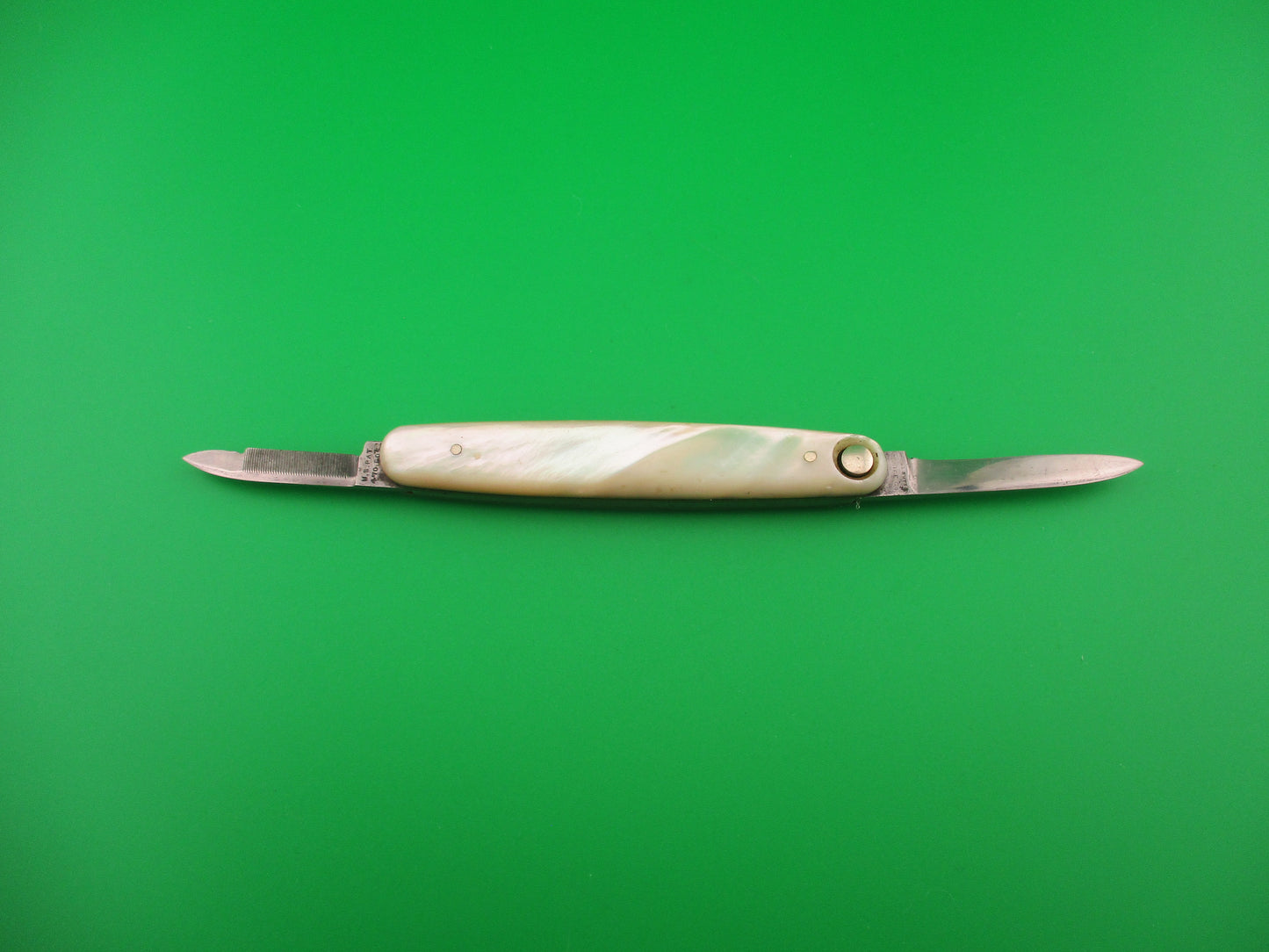 Press Button Knife Co medium double MOP model 105 antique switchblade knife