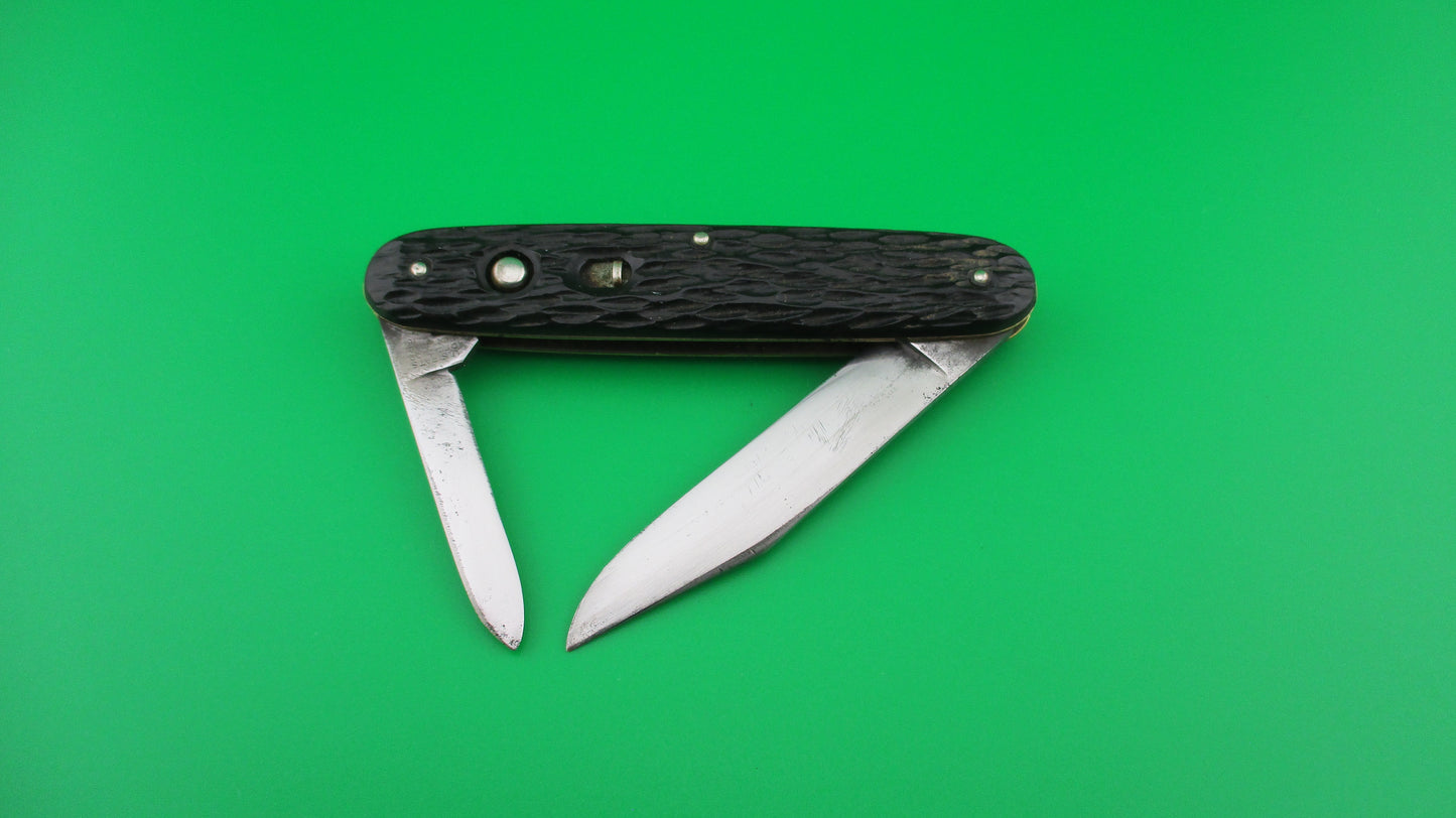 Schrade Cut Co Large Double 3 3/4 inch Black jigged switchblade knife