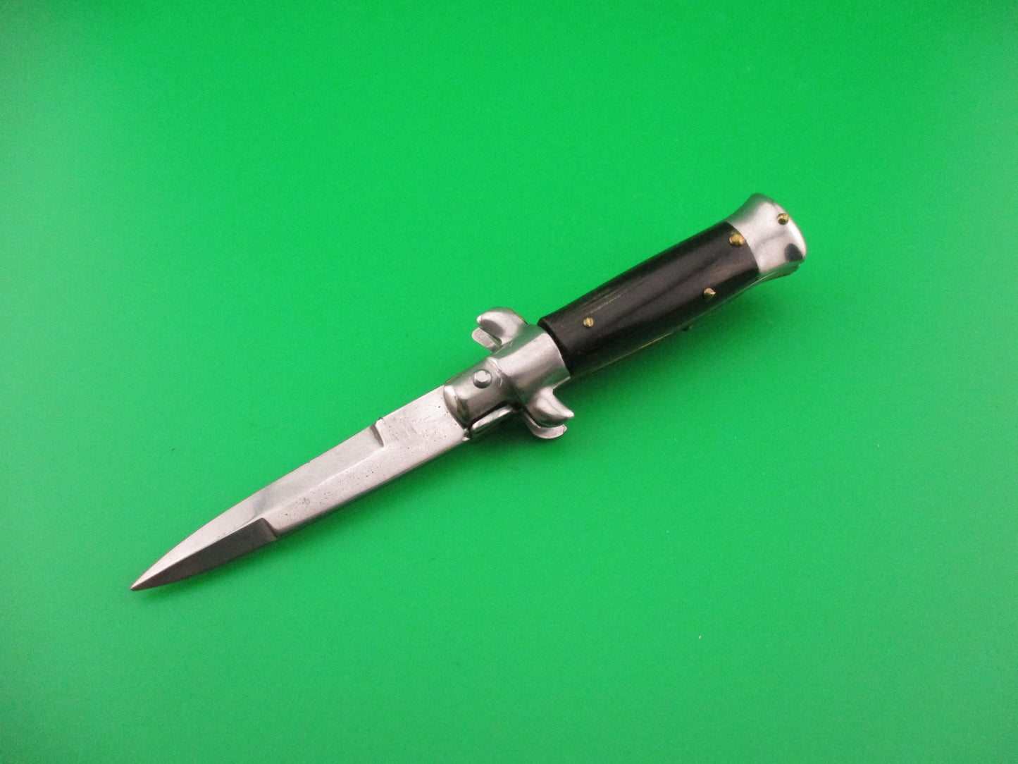 MANIAGO ITALY 12cm Italian Swivel bolster Bayonet streaked horn automatic knife