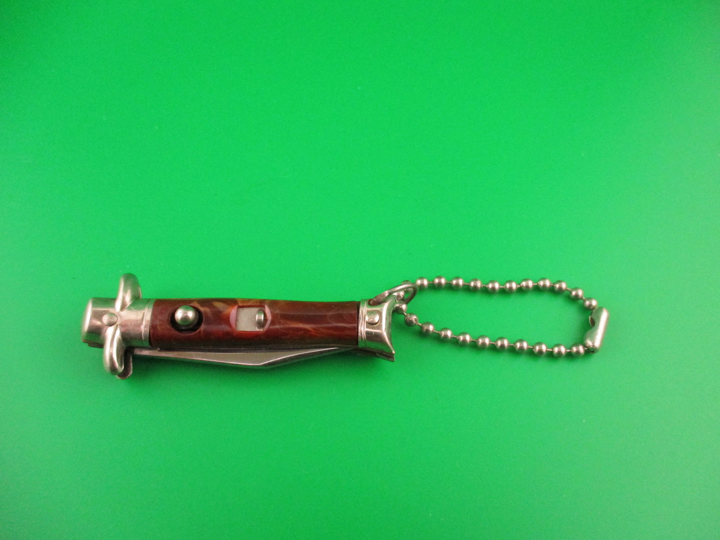 Colonial Snappy Vintage 2nd Gen 1950s Rootbeer bowtie keychain switchblade knife NM