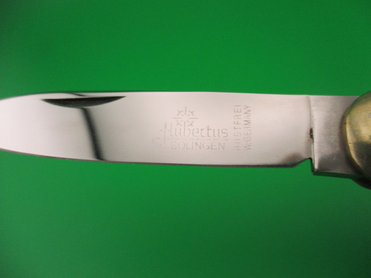 Hubertus Solingen 11cm West Germany Lever Black Micarta automatic knife