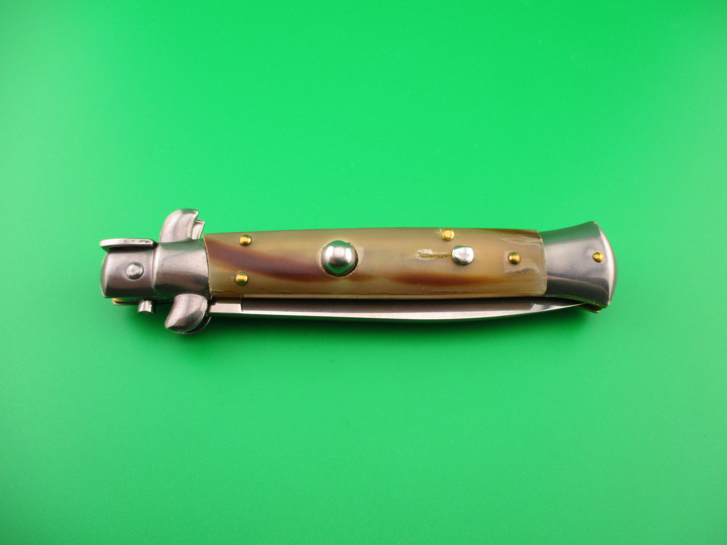 FRANK B 23cm Italian Stiletto Light Honey & Caramel horn swivel bolster automatic knife