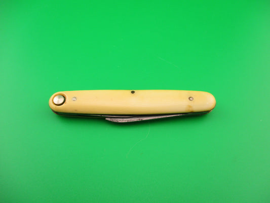 PRESS BUTTON KNIFE CO WALDEN, NY Medium double Ivory Cell switchblade knife