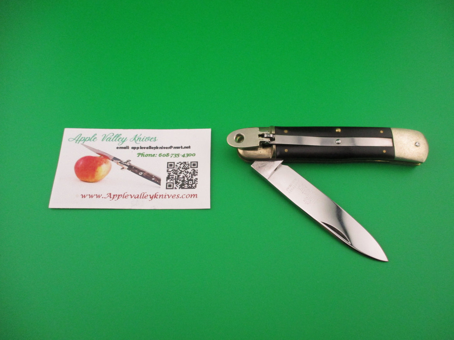 Hubertus Solingen 11cm West Germany Lever Black Micarta automatic knife