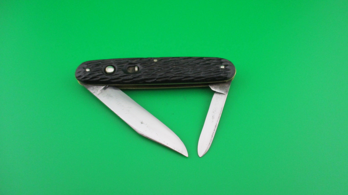 Schrade Cut Co Large Double 3 3/4 inch Black jigged switchblade knife