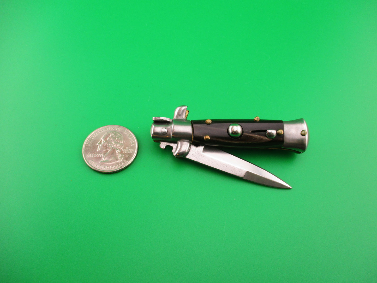 MANIAGO ITALY 12cm Italian Swivel bolster Bayonet streaked horn automatic knife