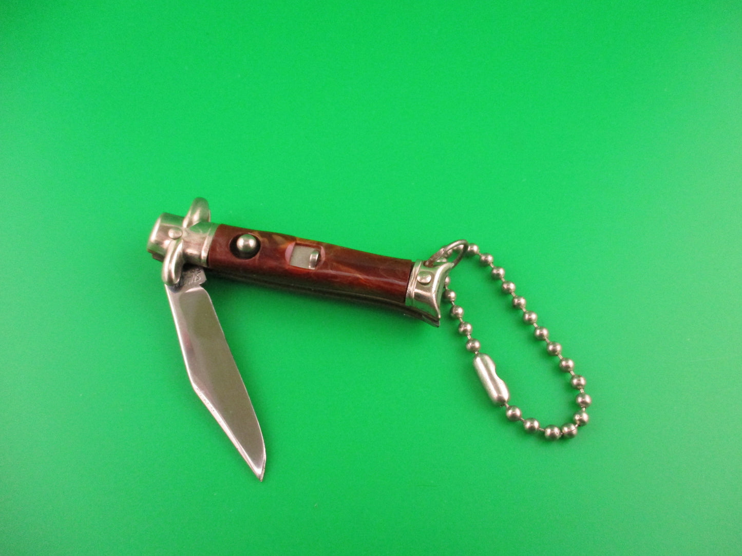 Colonial Snappy Vintage 2nd Gen 1950s Rootbeer bowtie keychain switchblade knife NM
