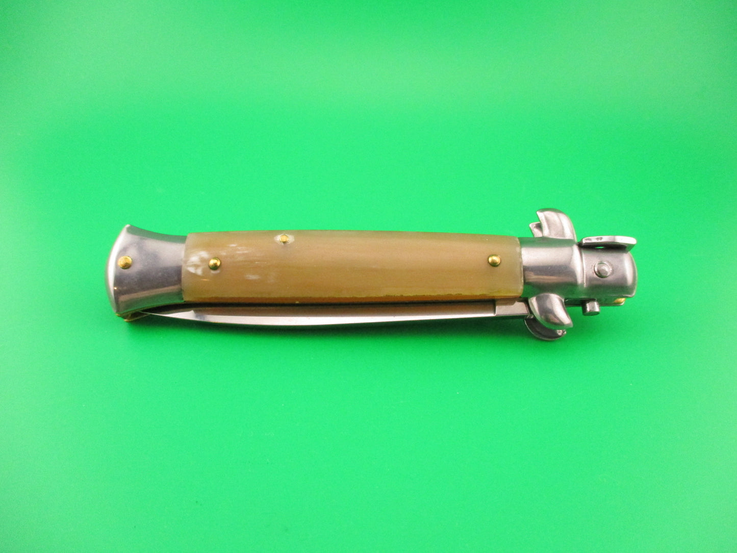 FRANK B 23cm Italian Stiletto Light Honey & Caramel horn swivel bolster automatic knife