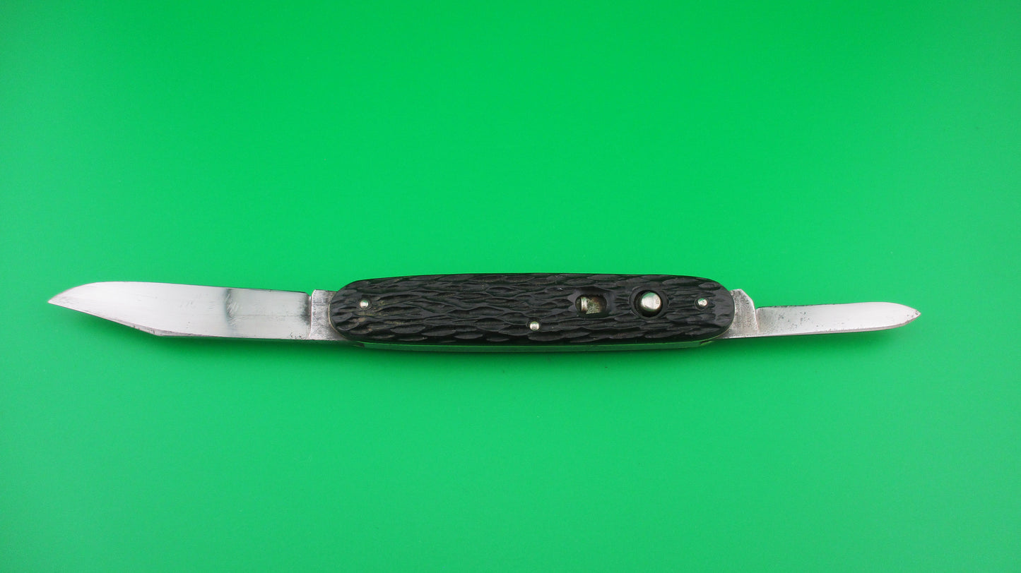 Schrade Cut Co Large Double 3 3/4 inch Black jigged switchblade knife