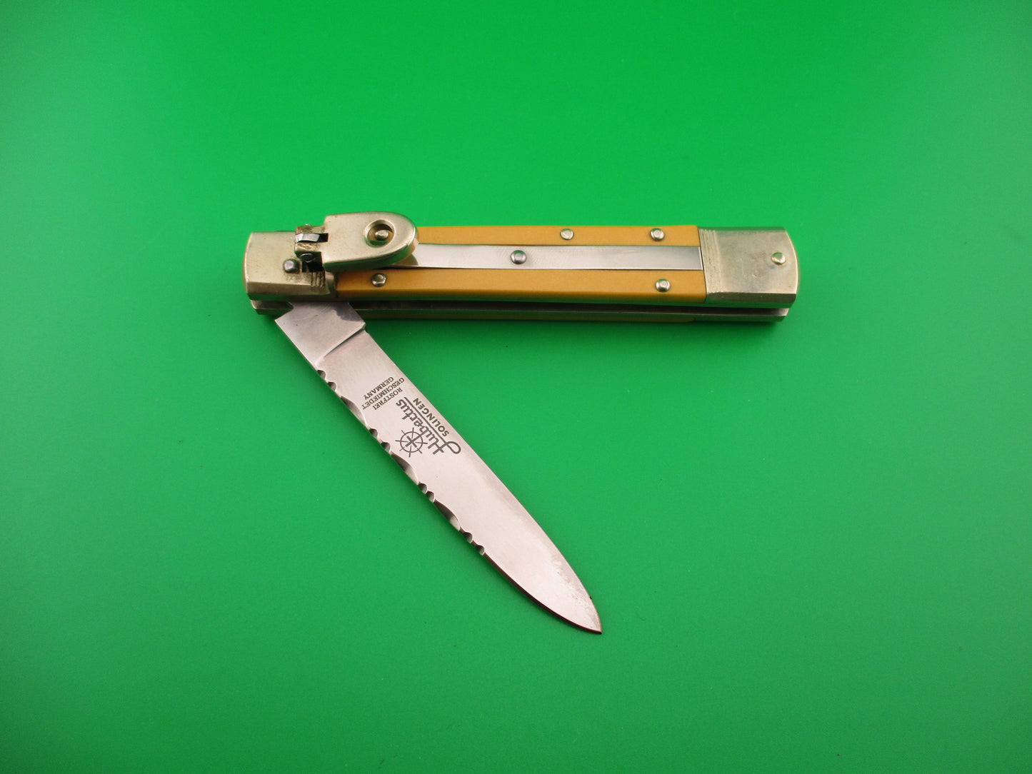 Hubertus SOLINGEN 11cm German Lever Slimline Yellow Micarta filework automatic knife